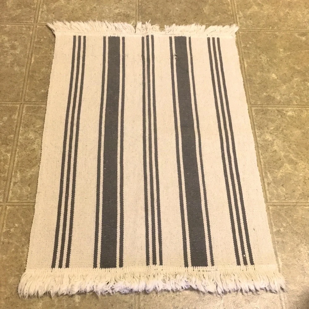 A bundle of 2 Floor mats.
